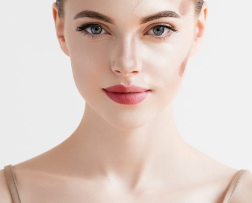 Closeup woman face. Contour Highlight makeup sample. Professional Contouring face white background